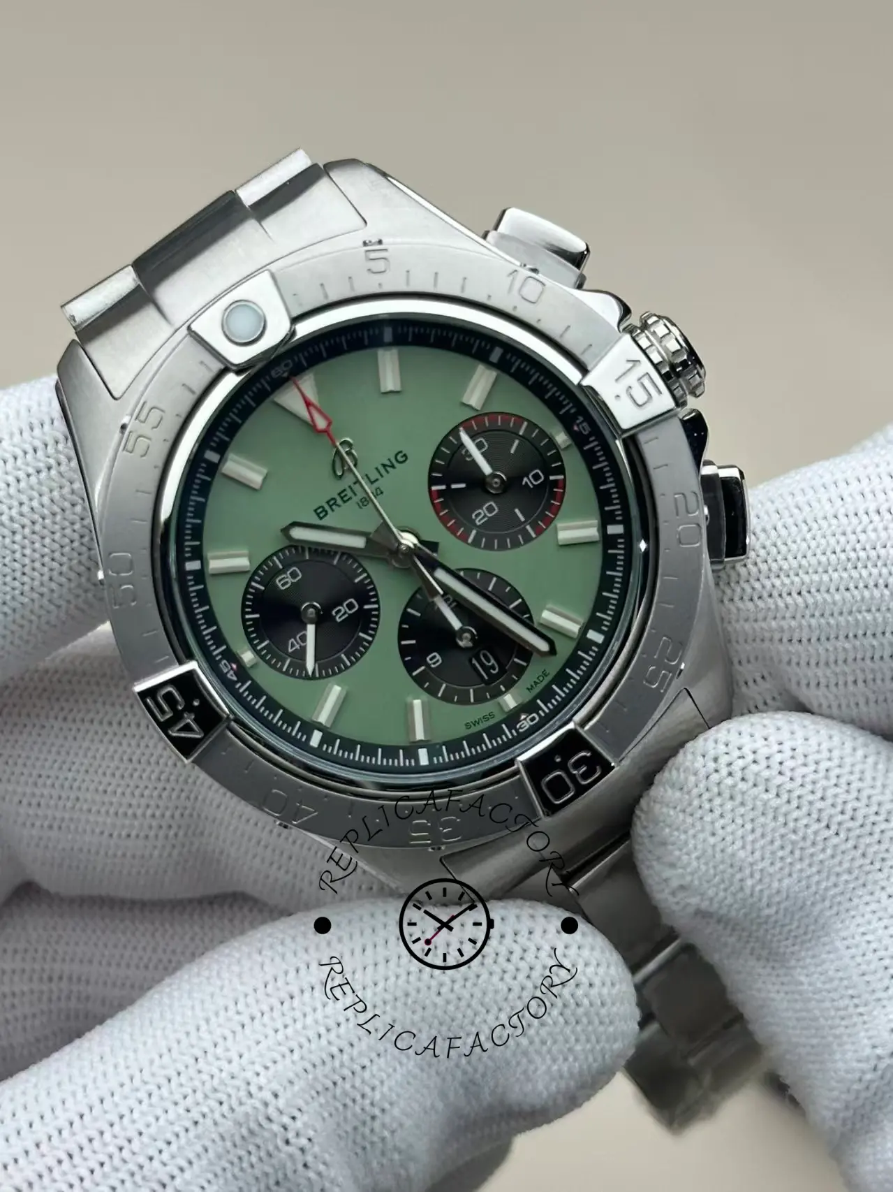 Angled front view of Breitling Avenger B01 Chronograph 42 AB0146101L1A1 showing mint green dial.