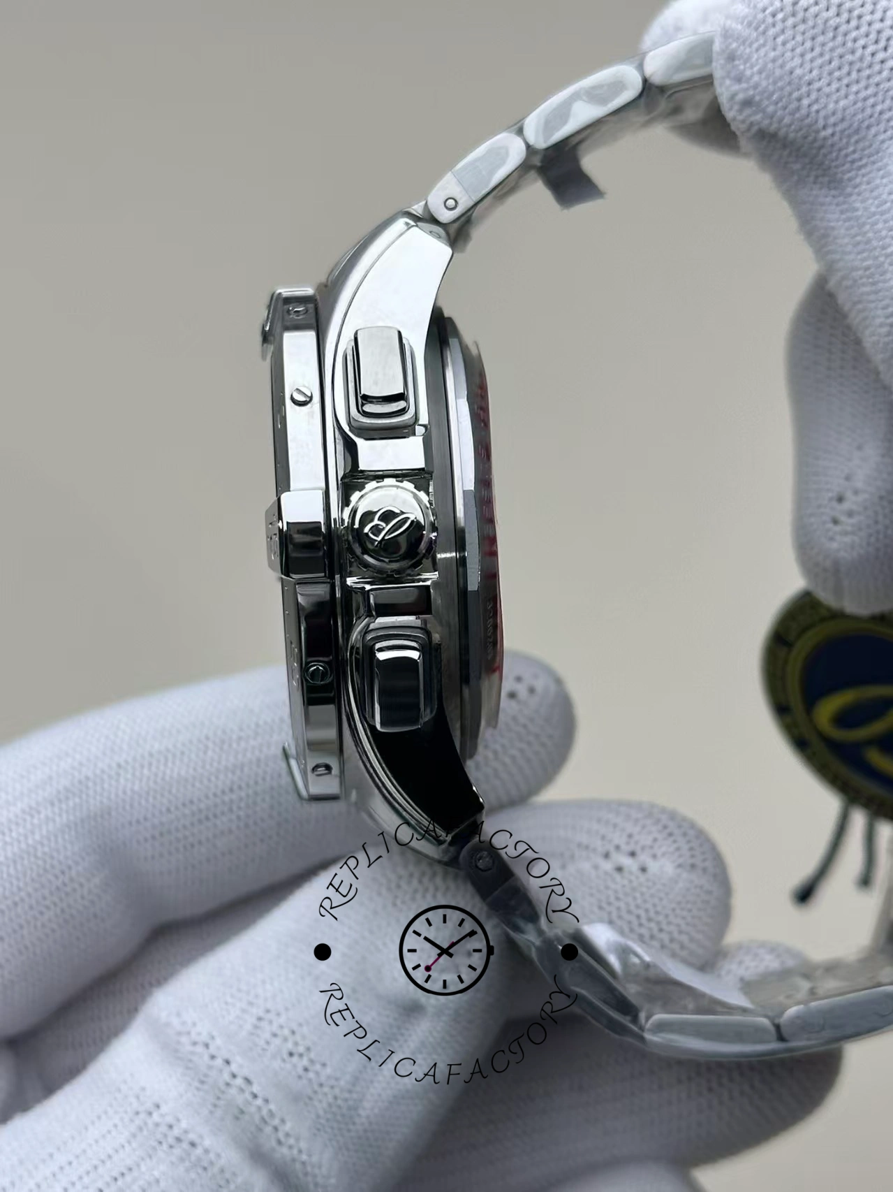 Side view of Breitling Avenger B01 Chronograph 42 AB0146101B1A1 with crown and pushers.