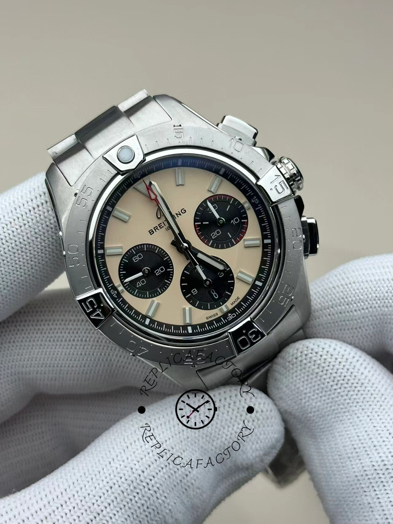 Close-up of Breitling Avenger B01 Chronograph 44 AB0147101A1A1 showing cream dial and black subdials.