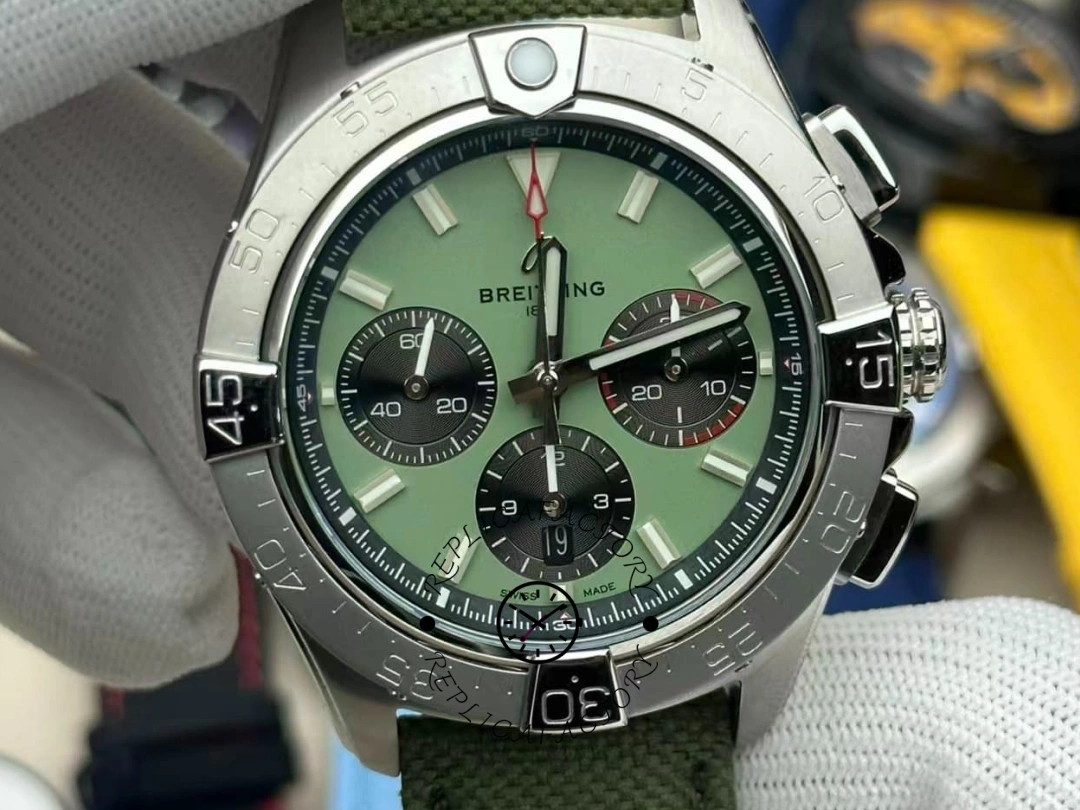 Close frontal shot of Breitling Avenger B01 Chronograph 44 AB0147101L1X1 showing hands and bezel numerals. - Front view