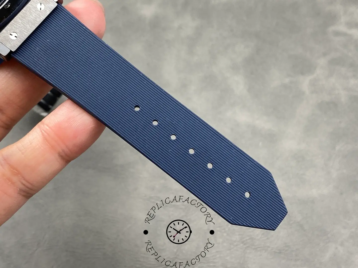 Blue rubber strap of Hublot Classic Fusion 542.CM.7170.RX with fine texture.
