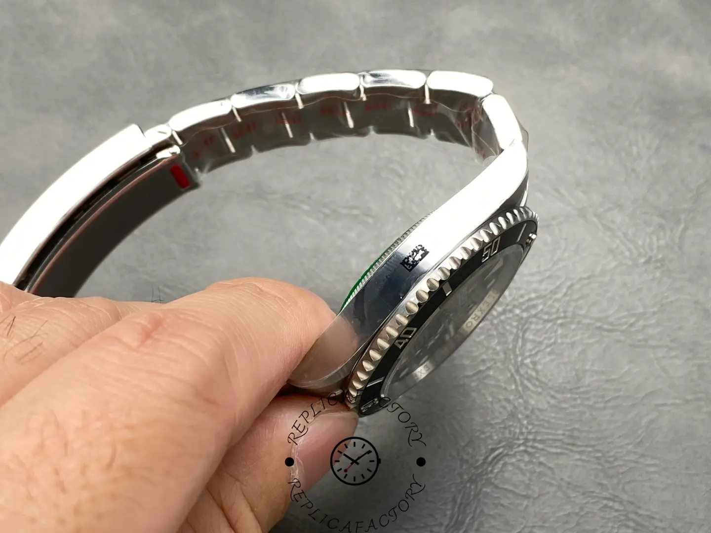 Left-side profile view of the Rolex Submariner 124060 case.