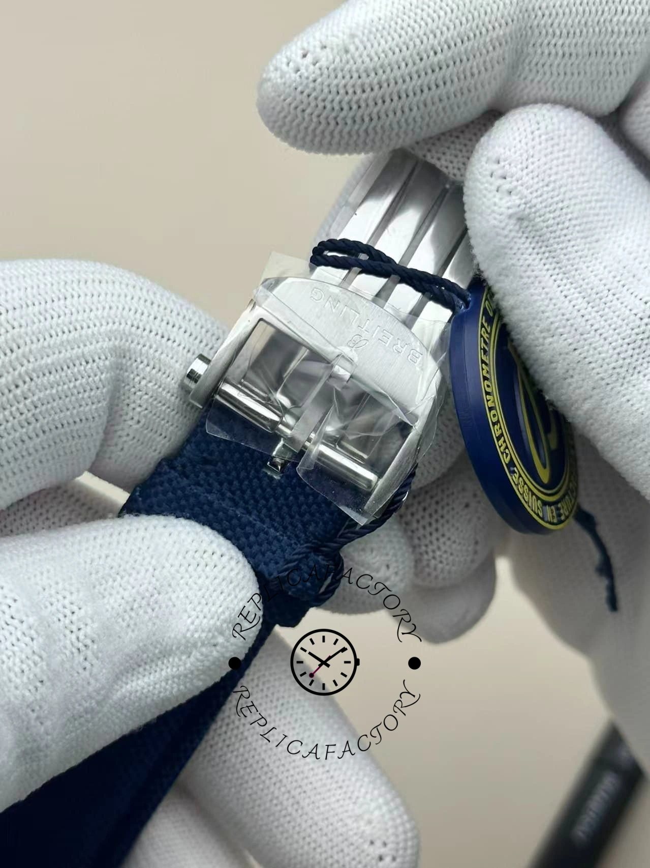 Close-up of the clasp on Breitling Avenger B01 Chronograph 44 AB0147101C1X1 blue strap.