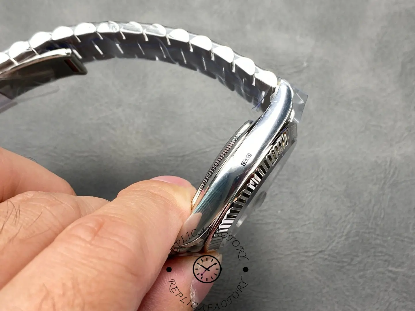 Side shot of Rolex Day-Date 228239 showing case thickness and polished lugs.