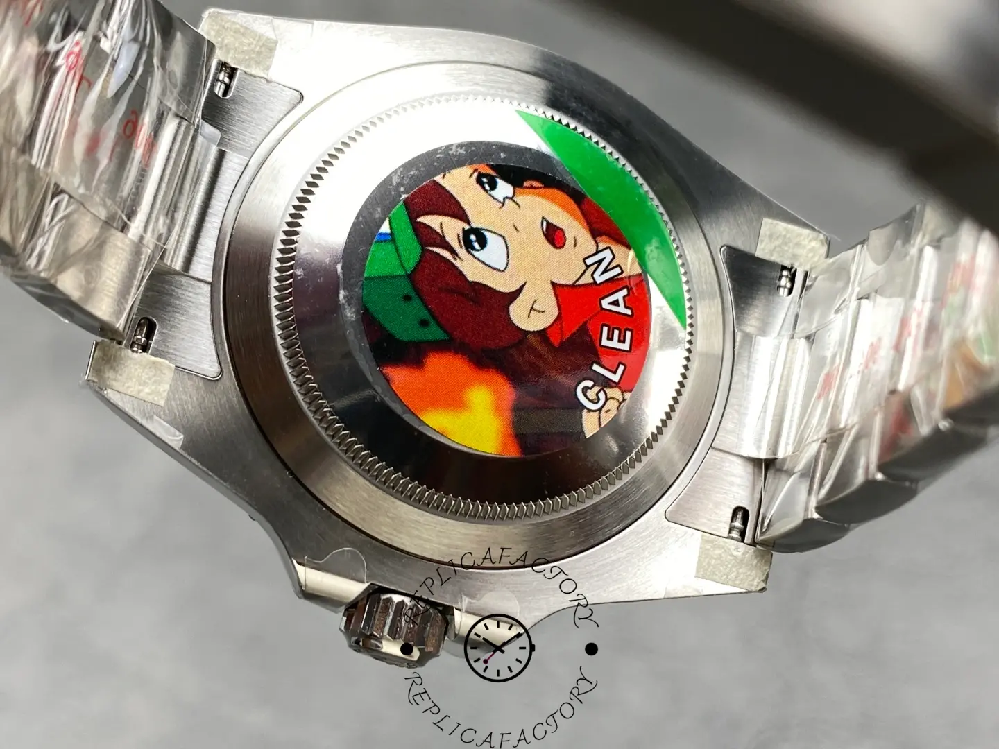 Caseback view of the Rolex Submariner 124060 with protective sticker.