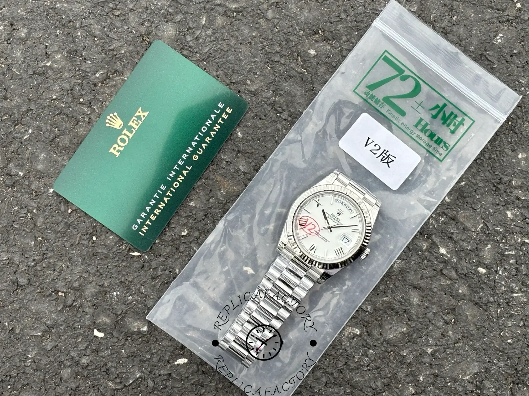 Full set image of Rolex Day-Date 228239 with guarantee card and sealed packaging.