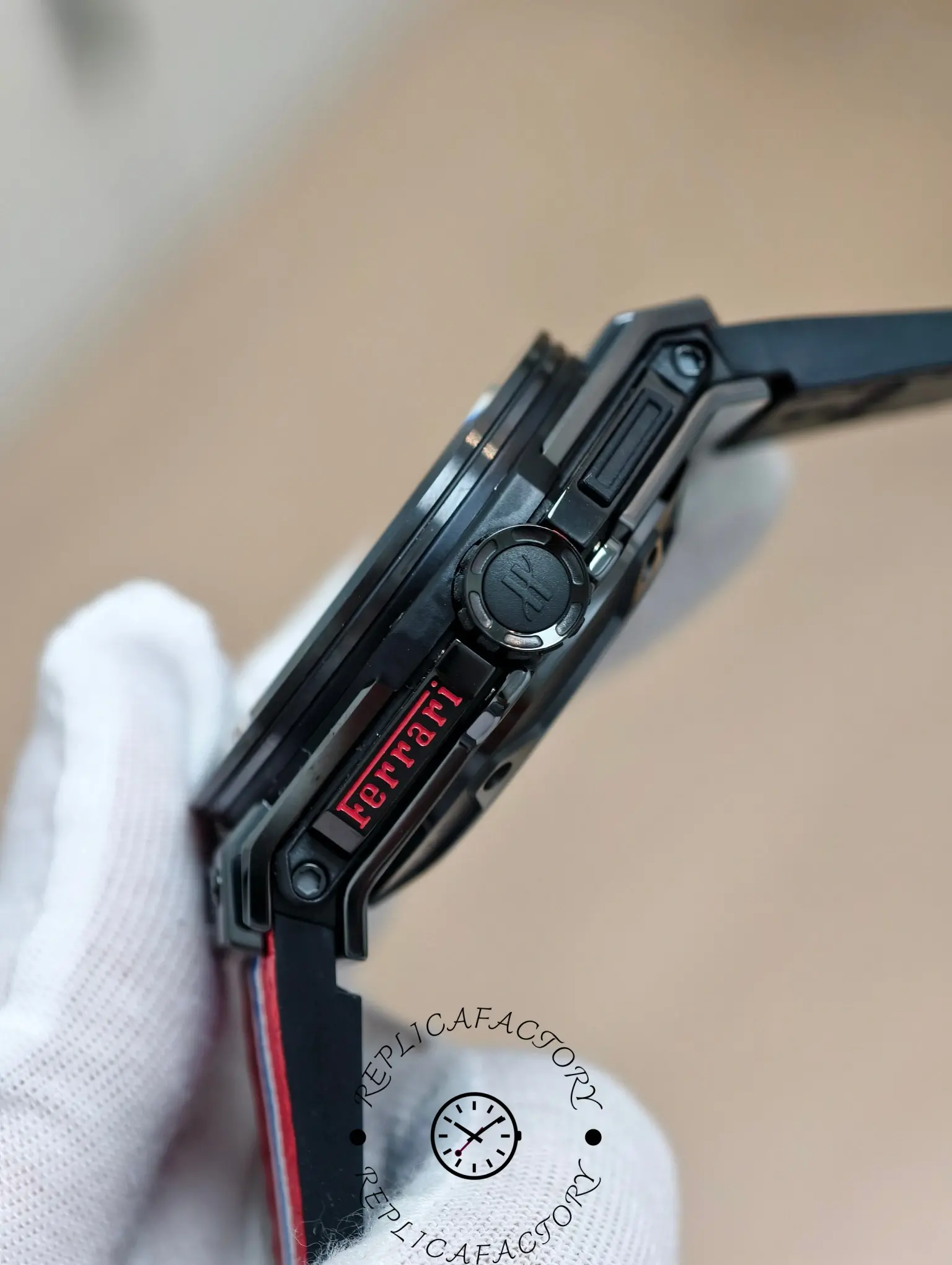 Right-side view of Hublot Big Bang 401.CX.1123.VR showing Ferrari red logo and crown.