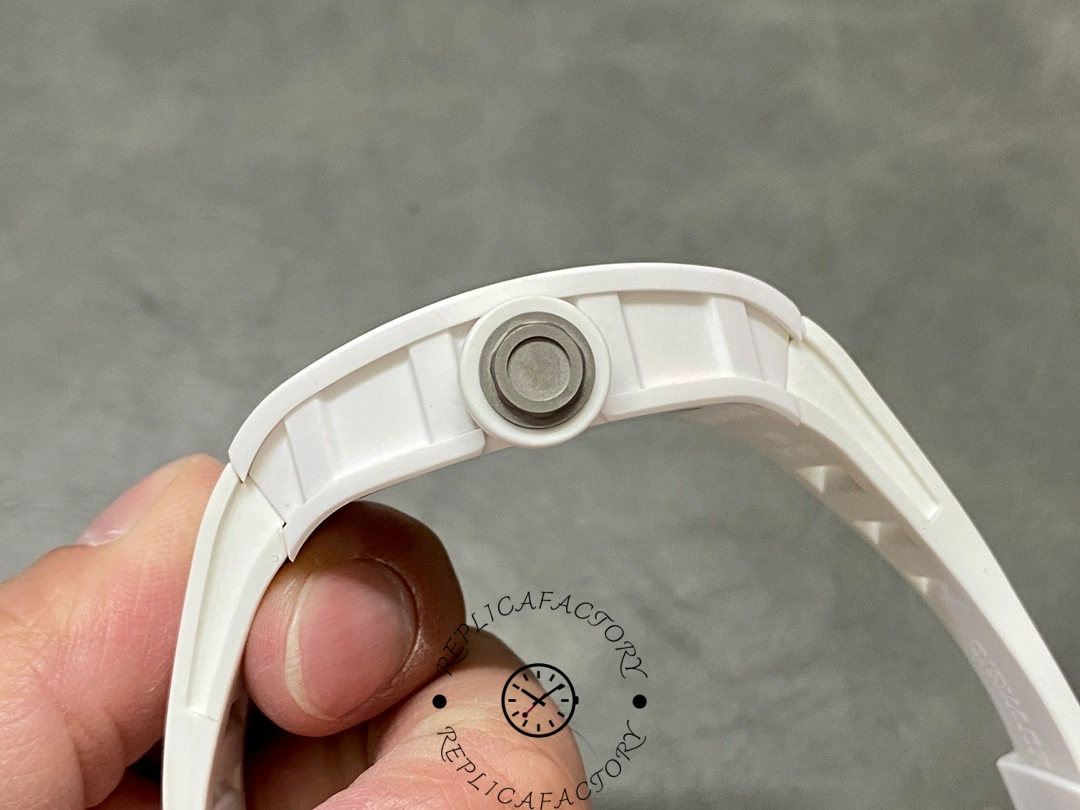 Side view of Richard Mille RM 055 RMUL2 highlighting white ceramic case and crown.