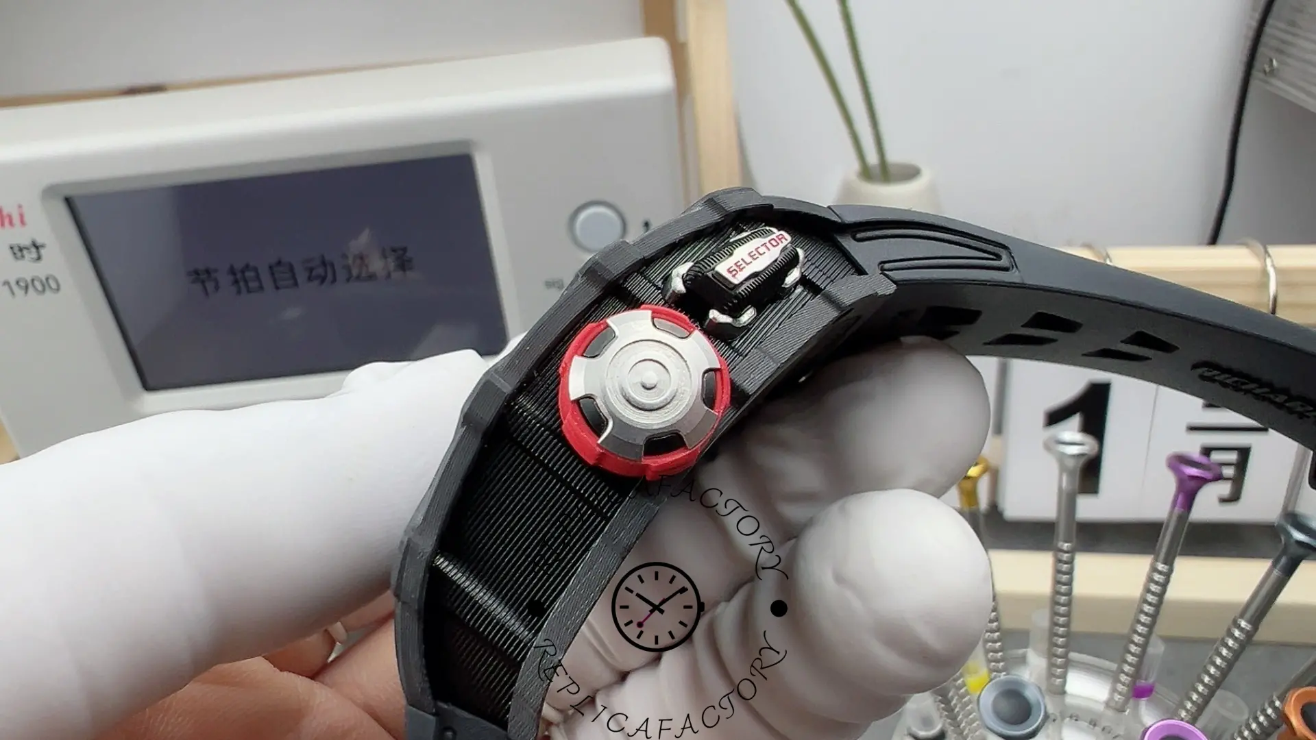 RM35-03 crown side showing red selector crown and carbon case.