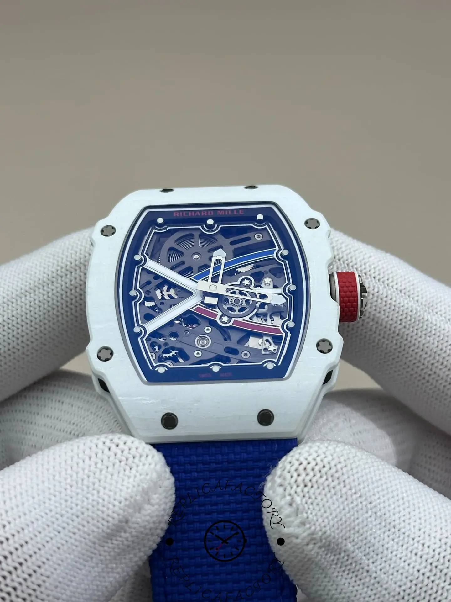 RM 67-02 Alexis Pinturault replica front in soft lighting with blue ring dial.