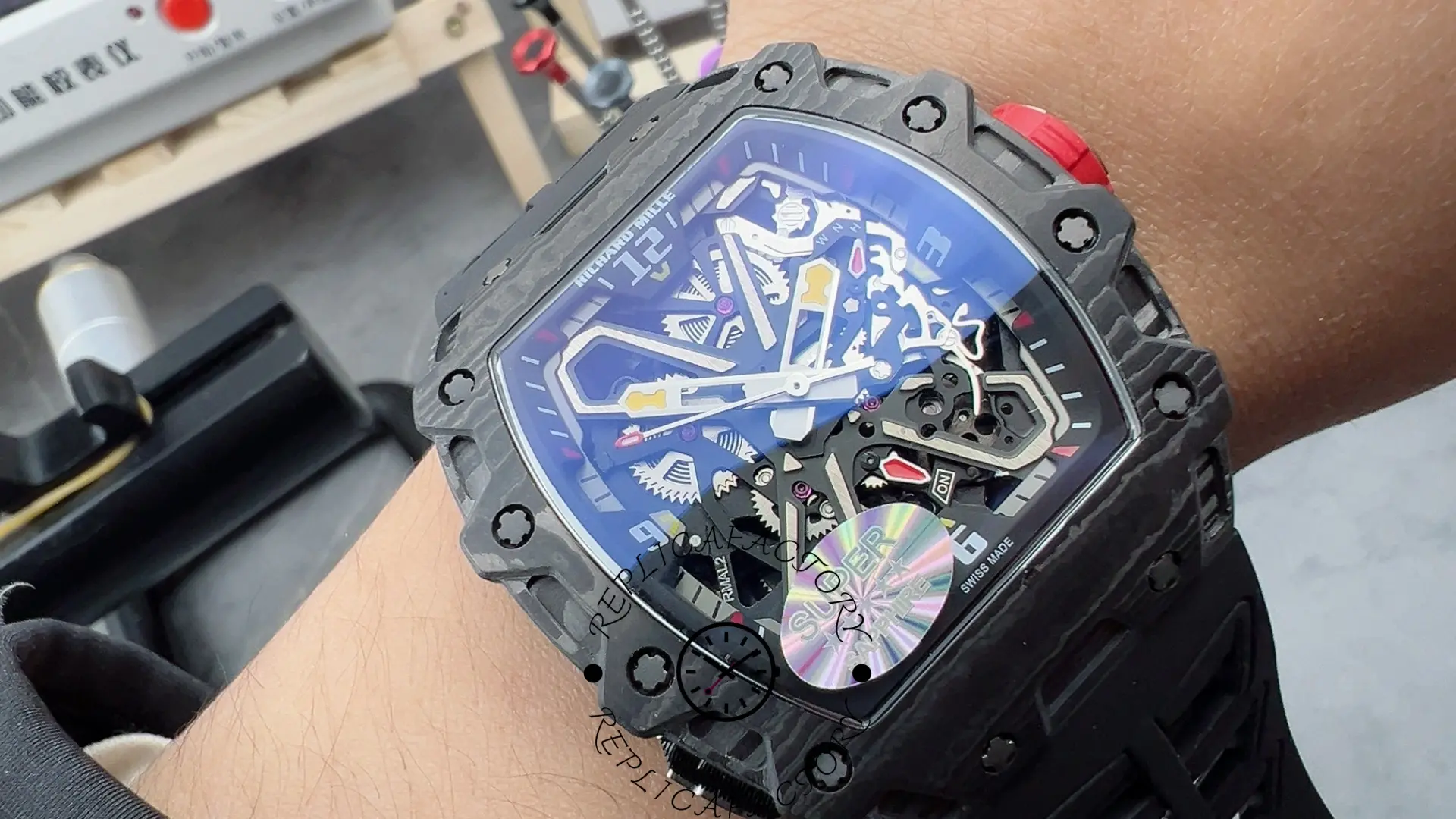 Wrist shot of RM35-03 1:1 clone showing carbon case and skeleton dial.
