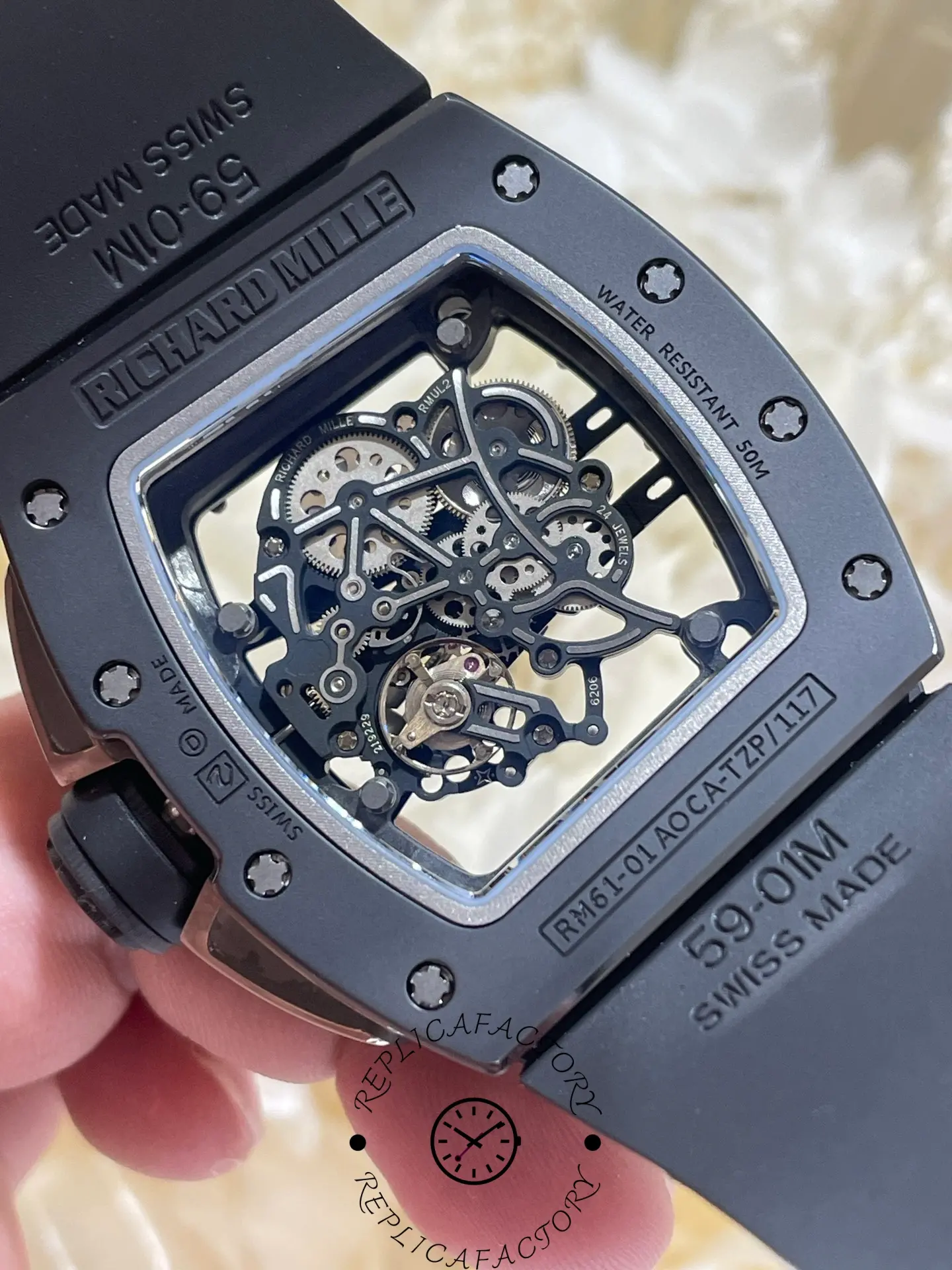 Rear view showing RM61-01 transparent caseback and skeleton movement.