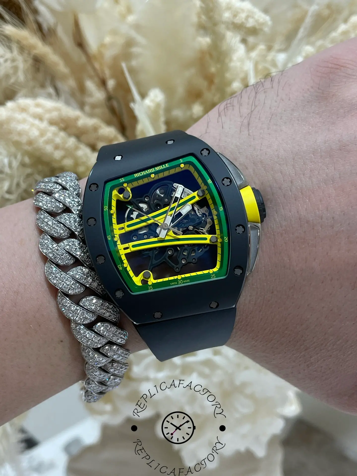 Wrist shot of RM 061-01 replica showing fit, skeleton dial, and bold yellow accents.