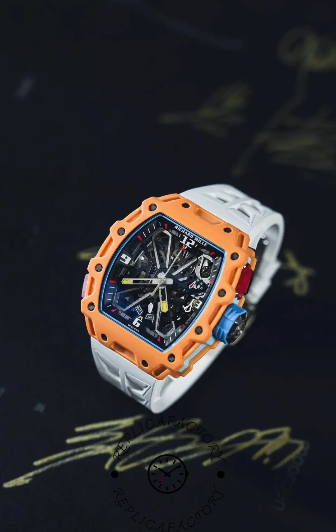 Richard Mille RM35-03 with orange bezel and white strap placed on RM sketch background.