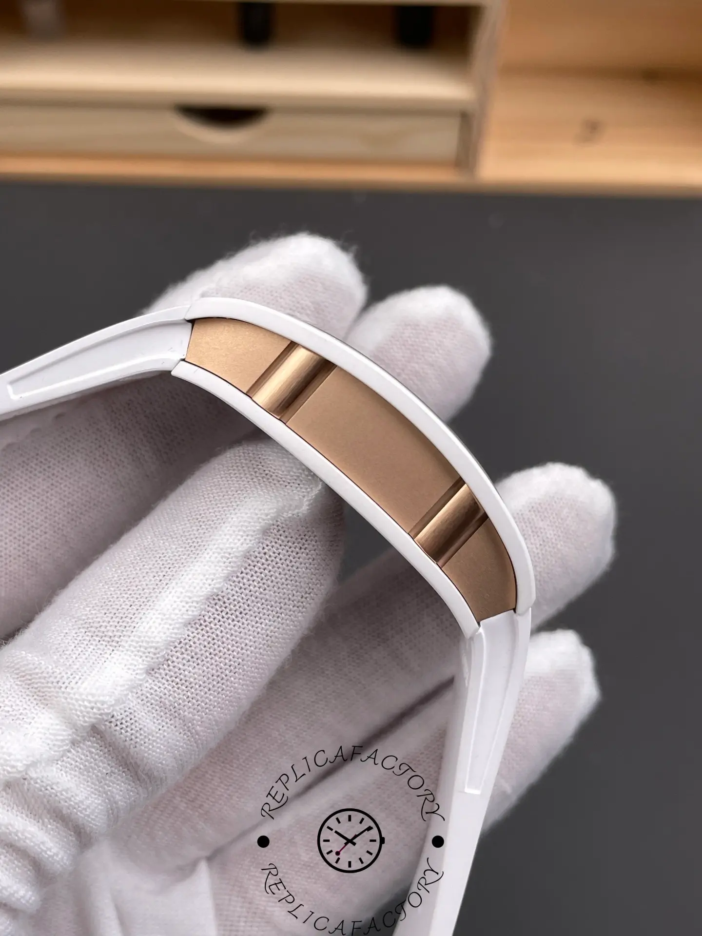 Richard Mille RM07-01 side case detail with gold insert and white case edges.