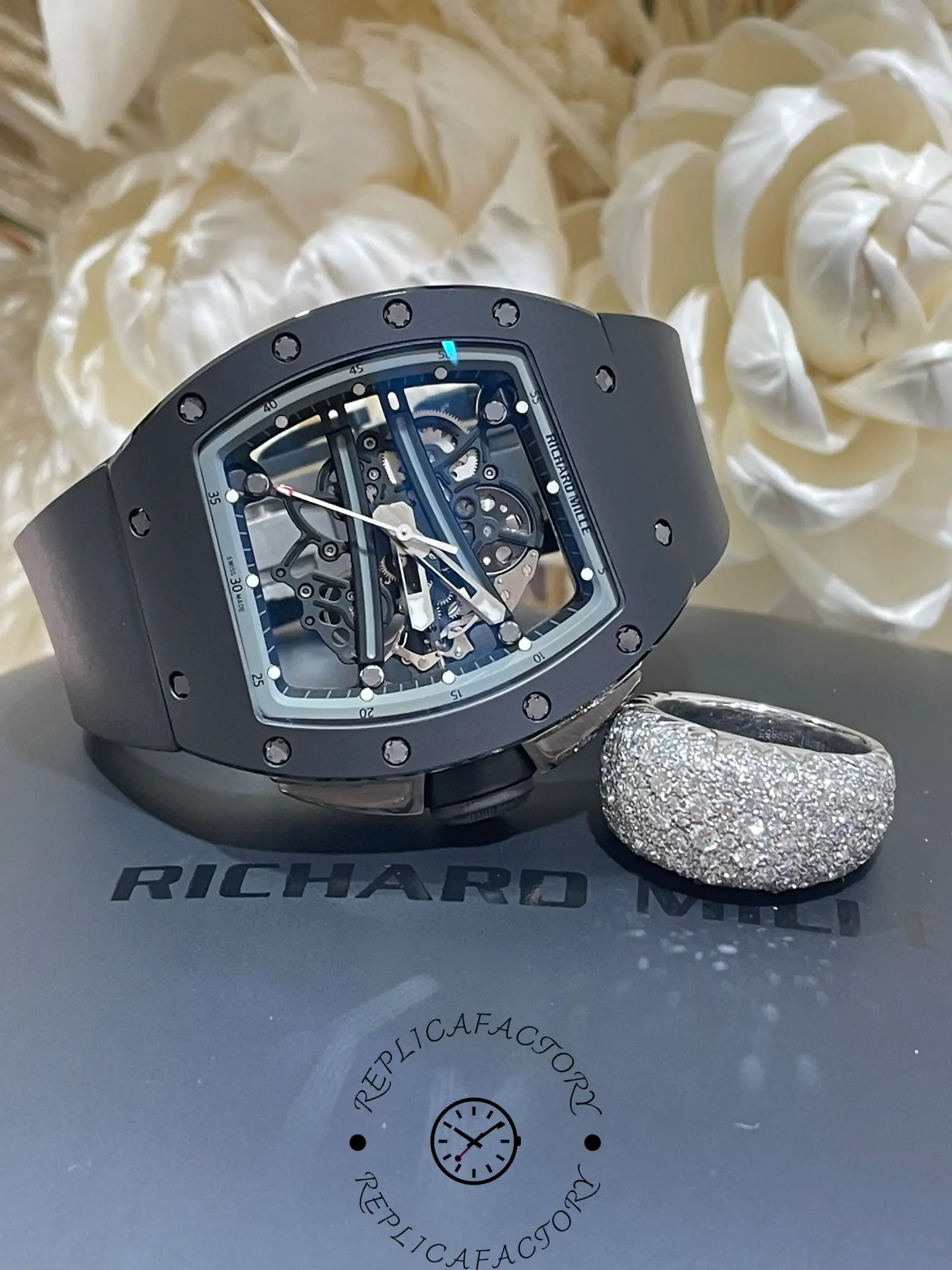 RM61-01 replica displayed on a box, highlighting ceramic bezel and movement.