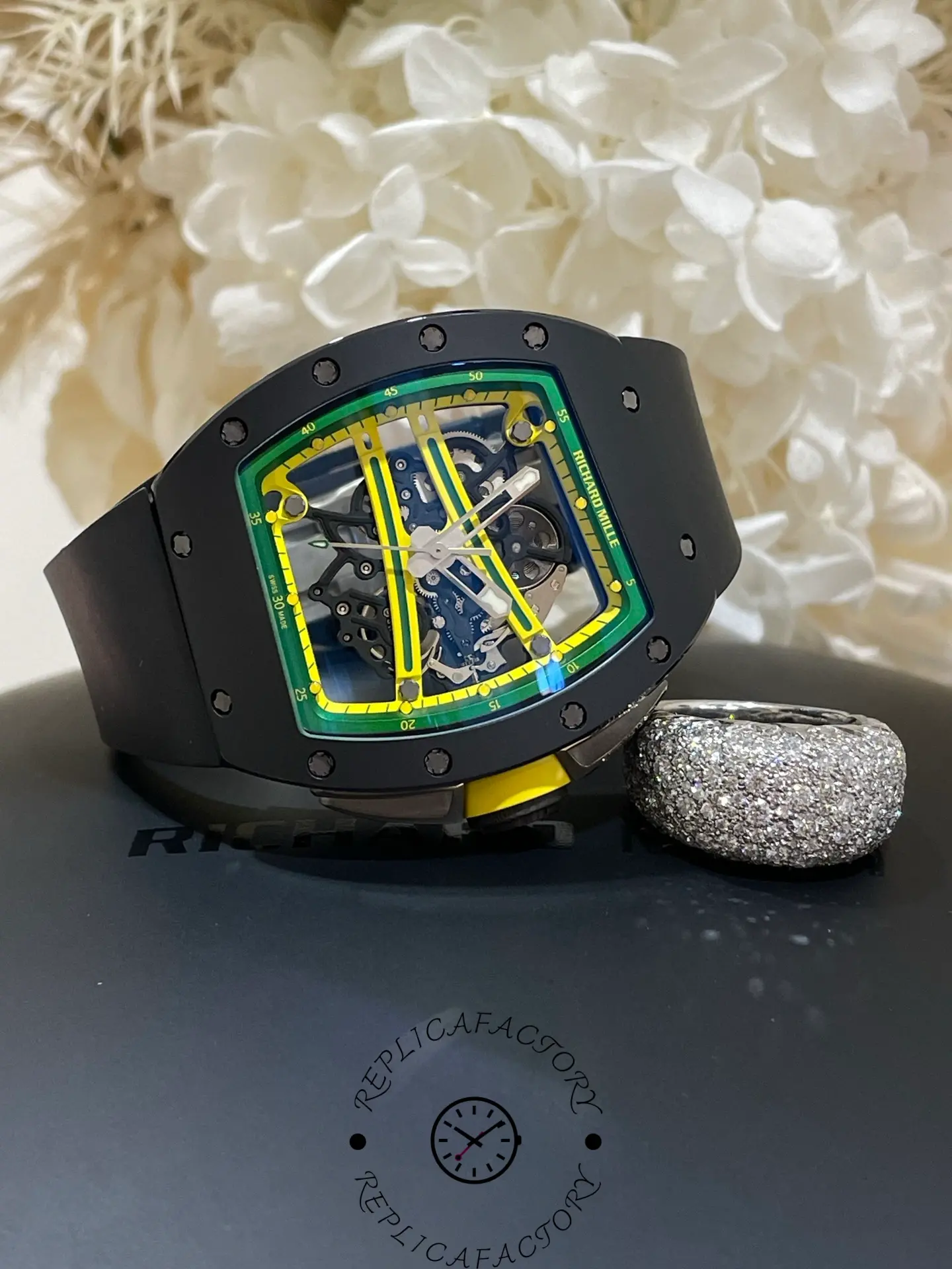 Angled shot of RM 061-01 replica highlighting carbon case and vivid skeleton movement.
