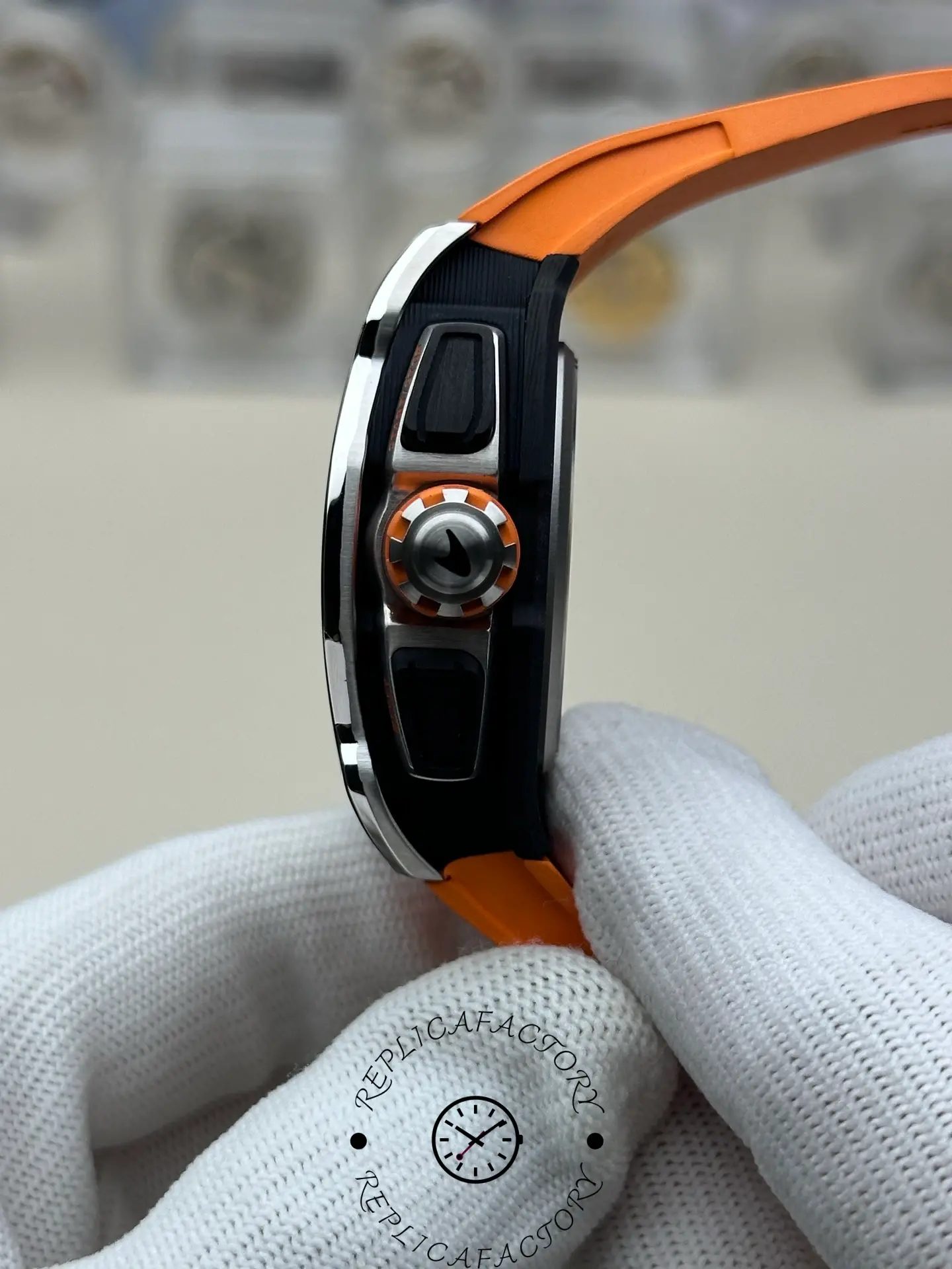 Side crown view of the RM 65-01 replica showing the textured carbon case.