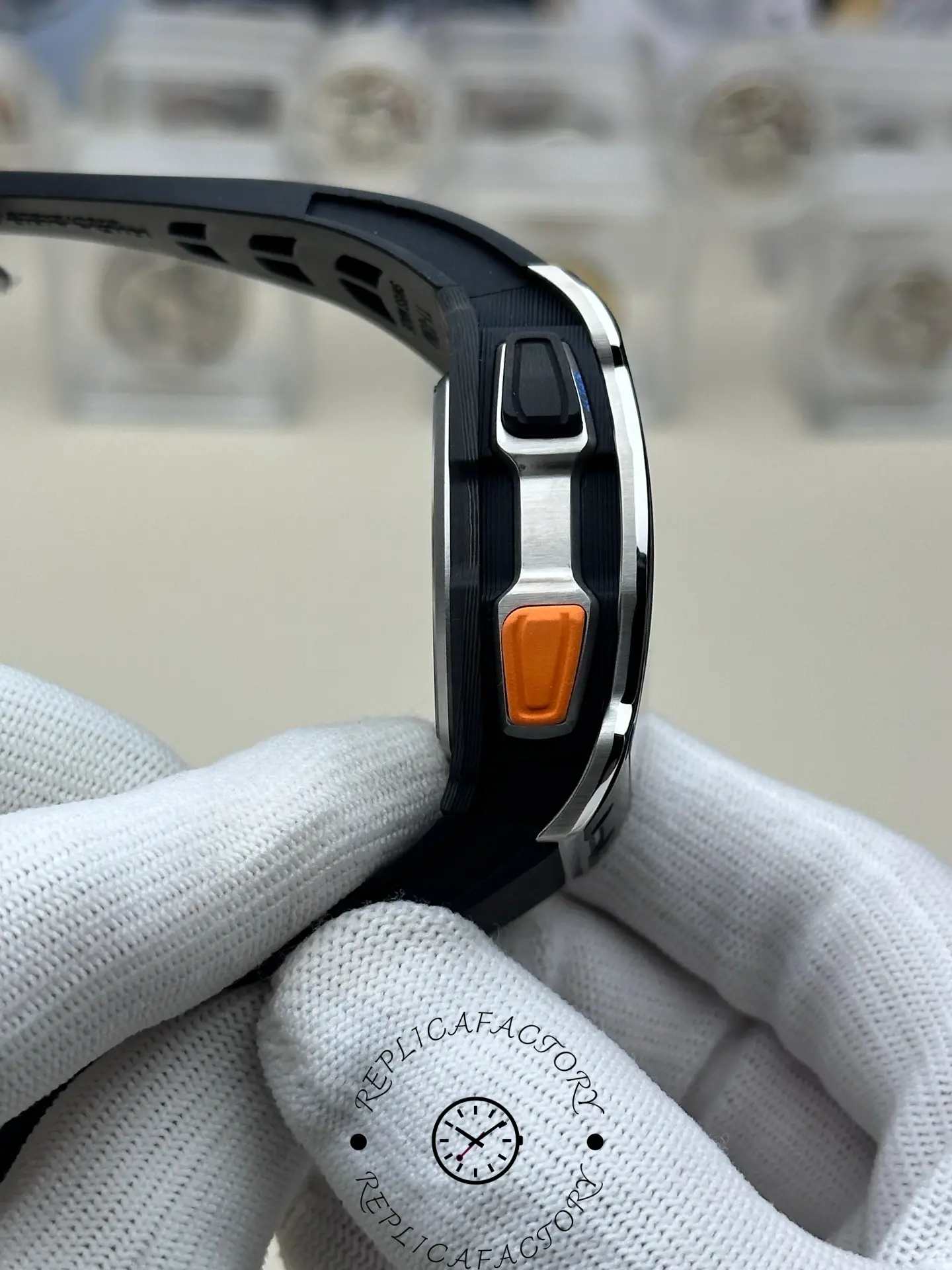 Side profile of RM 65-01 replica showing chronograph pushers and titanium frame.