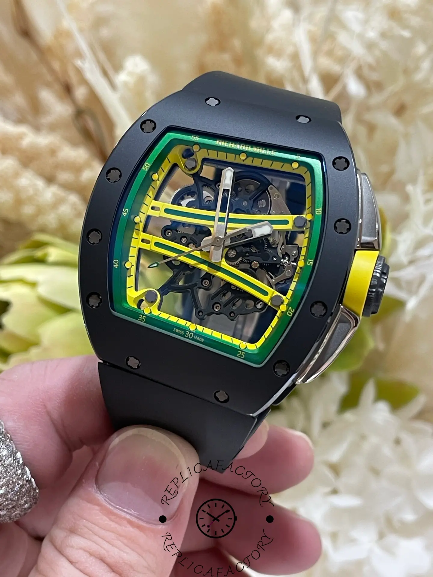 Detailed view of RM 061-01 replica showing bezel screws and colored inner frame.