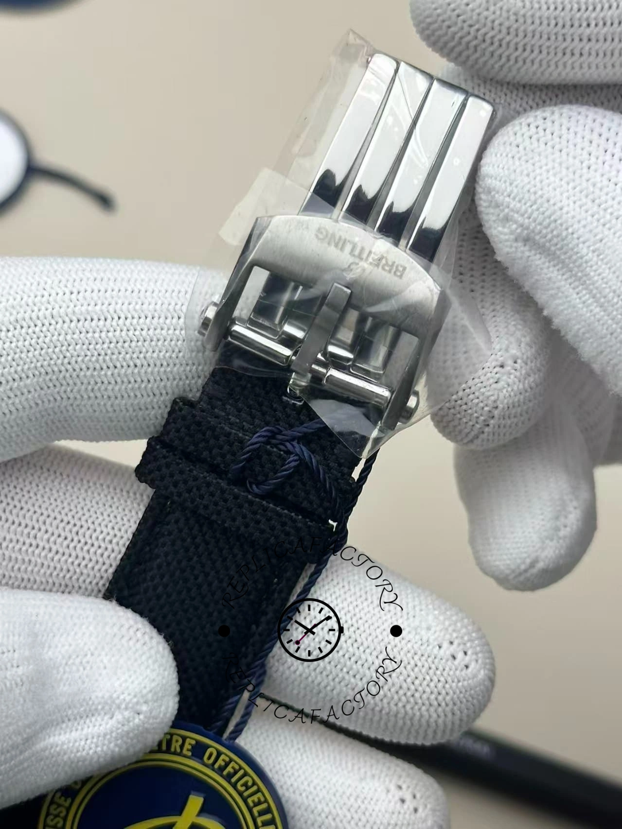 Close-up of Breitling buckle on the Avenger B01 Chronograph 44 Night Mission SB0147101I1X2 fabric strap.