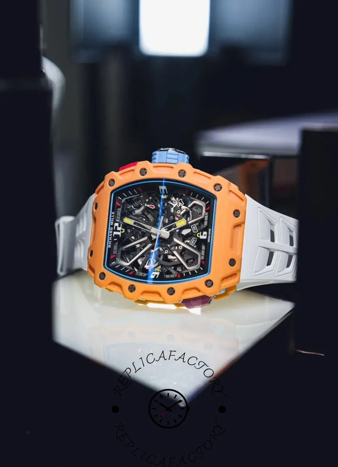 Richard Mille RM35-03 orange bezel on white strap, angled view highlighting skeleton dial.