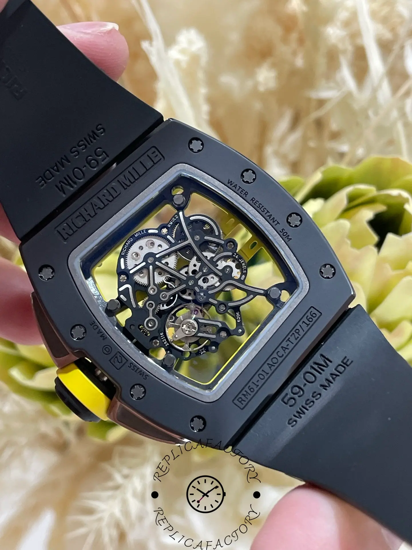 Back view of RM 061-01 replica with sapphire window revealing skeleton movement.