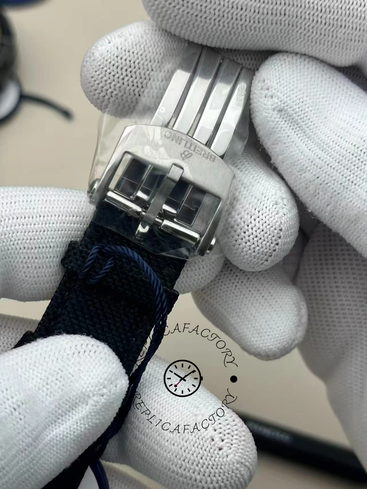 Clasp detail of the Breitling Avenger B01 AB0146101B1X1 with polished Breitling buckle.