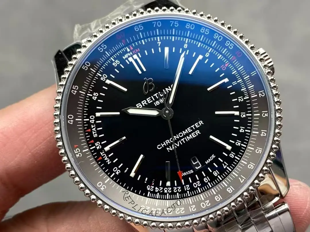 Detailed dial view of the Breitling Navitimer A17325241B1A1 with luminous hands and blue gradient upper ring.