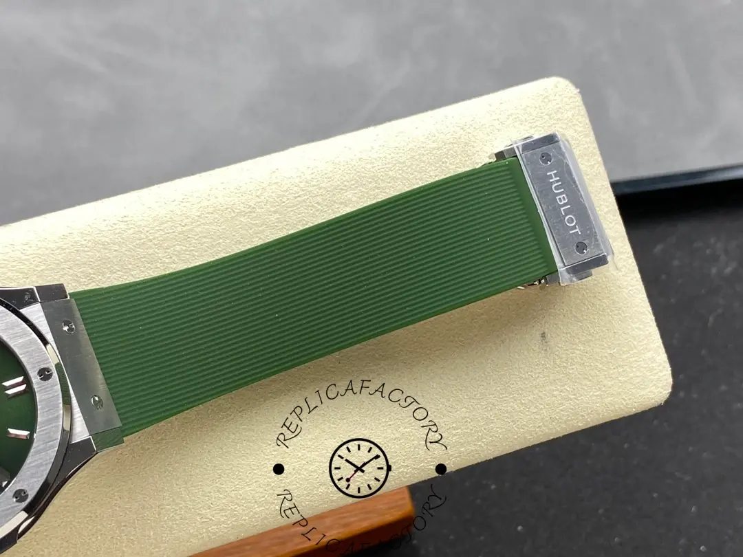 Hublot 542.NX.8970.RX green rubber strap with Hublot clasp close-up.