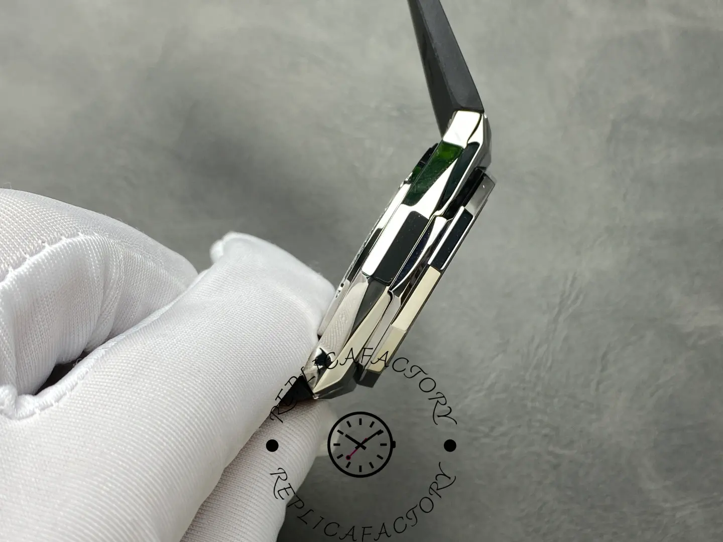 Angled side view of Hublot 550.NS.1800.RX.ORL19 highlighting faceted case edges.