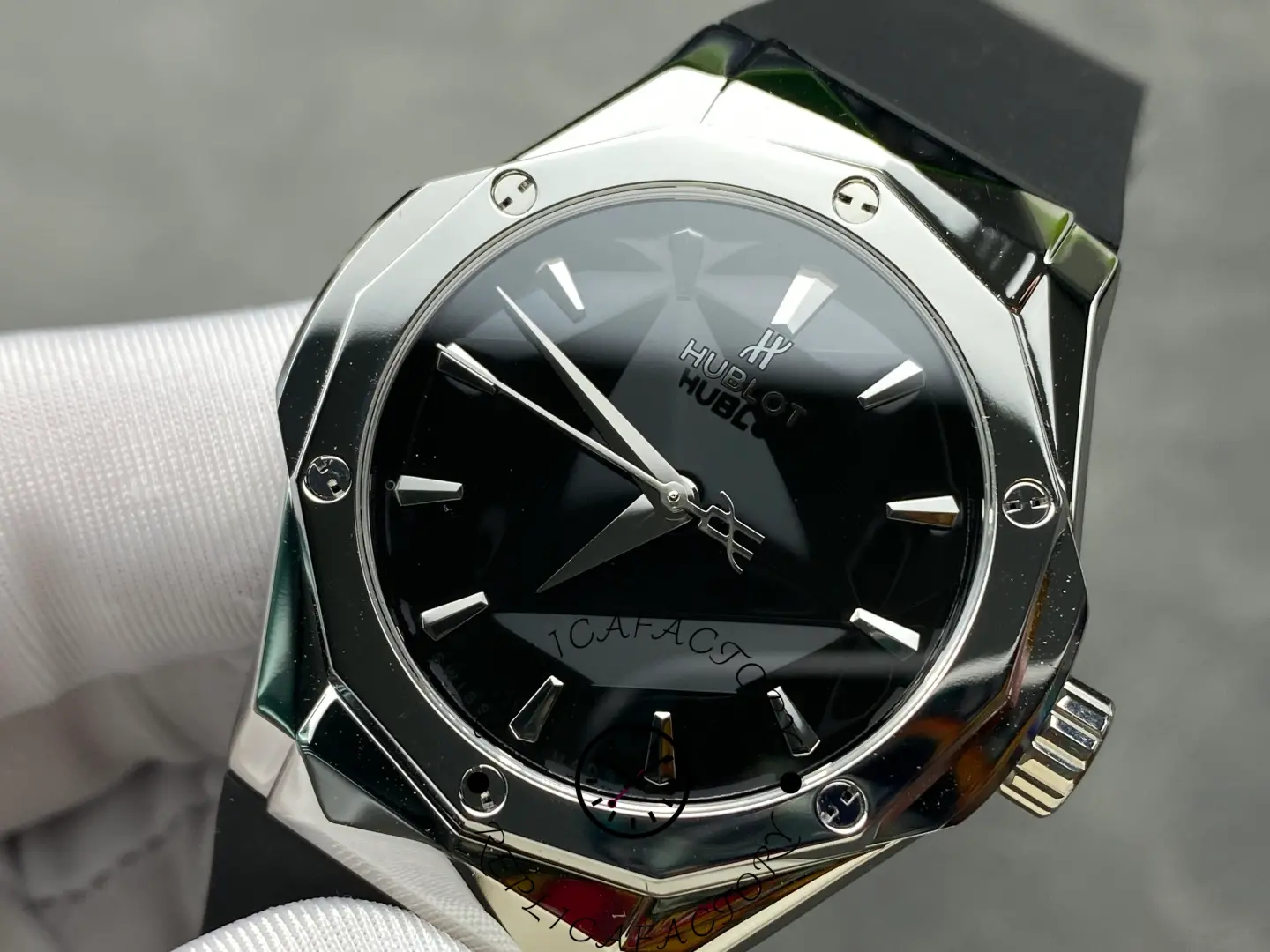 Hublot 550.NS.1800.RX.ORL19 viewed from side, emphasizing polished titanium bezel.