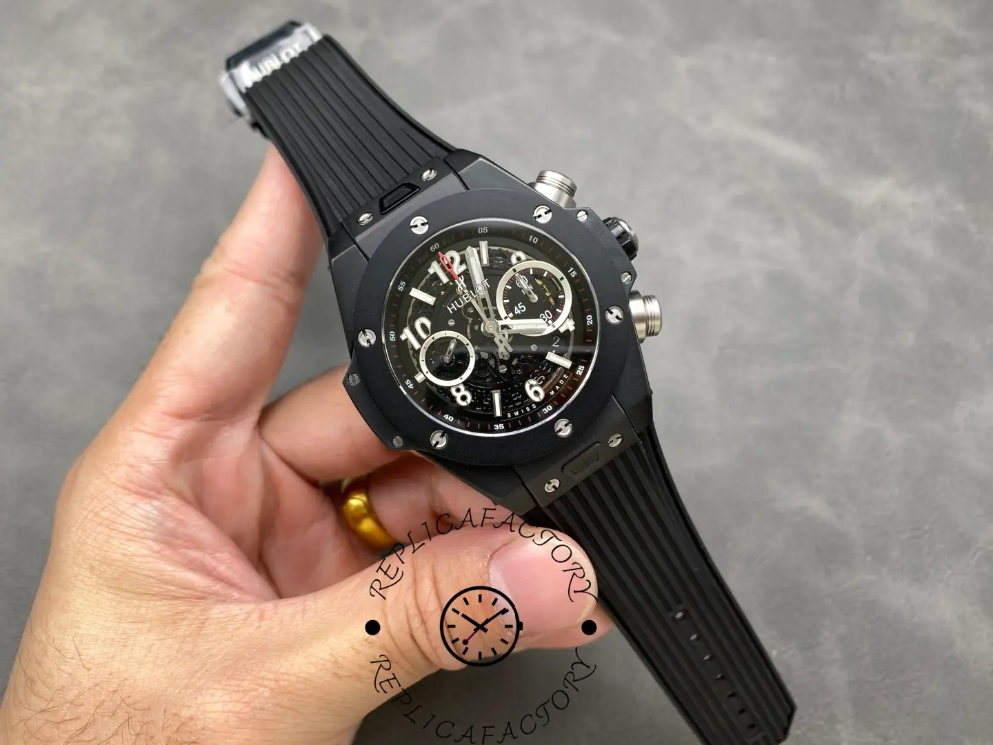 Wrist-level view of Hublot Big Bang Unico 441.CI.1170.RX with black rubber strap.