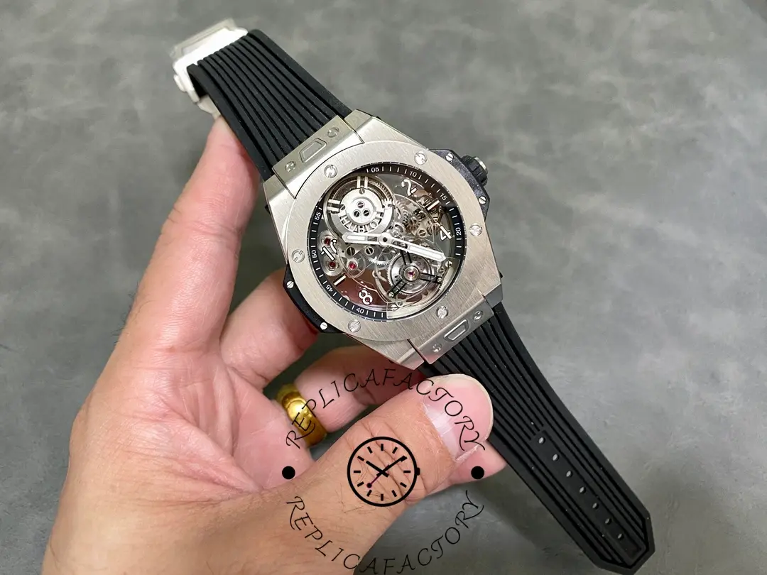 Full watch view of the Hublot Big Bang Tourbillon 45mm replica on hand with skeleton dial.