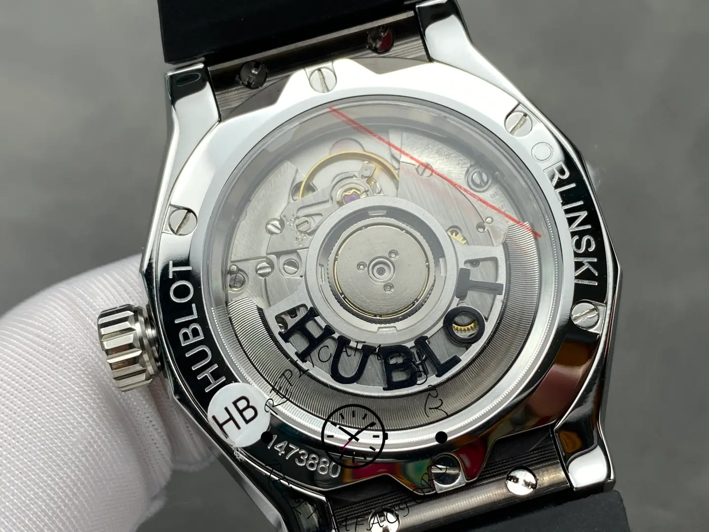 Exhibition case back of Hublot 550.NS.1800.RX.ORL19 showing rotor and movement.