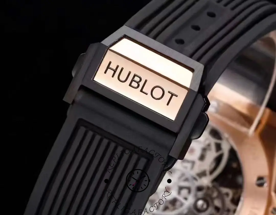 Hublot clasp on 414.OI.1123.RX replica rubber strap with gold accent plate.