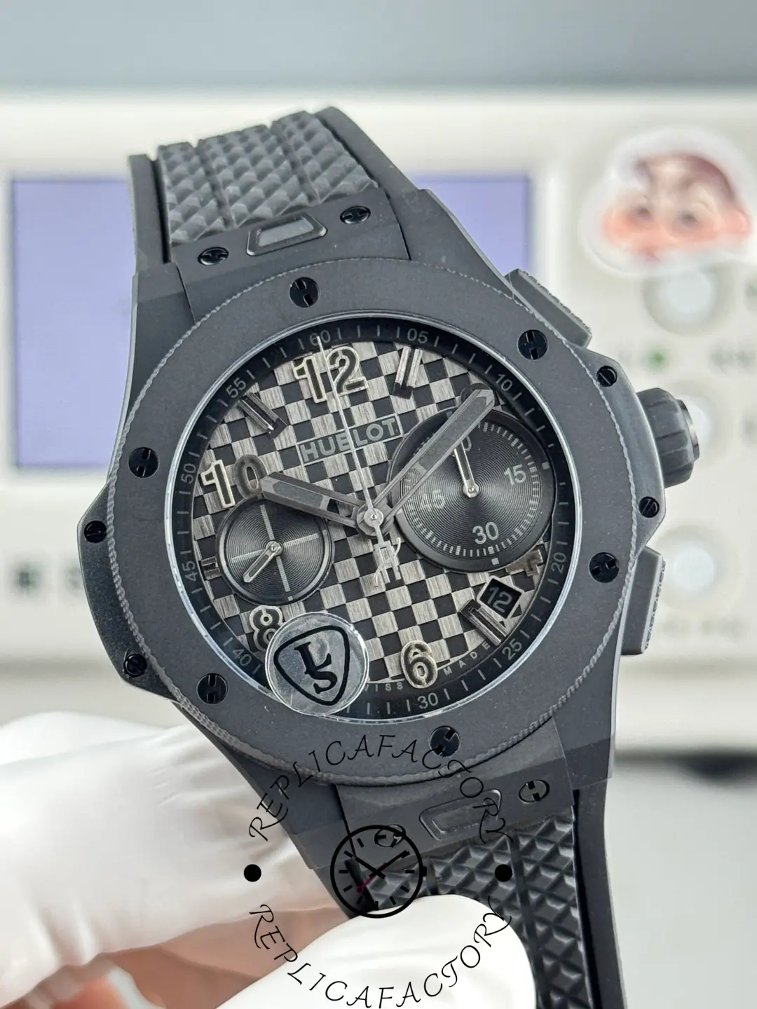 High-angle view of Hublot Big Bang 431.CI.1340.RX replica with carbon checkered dial.
