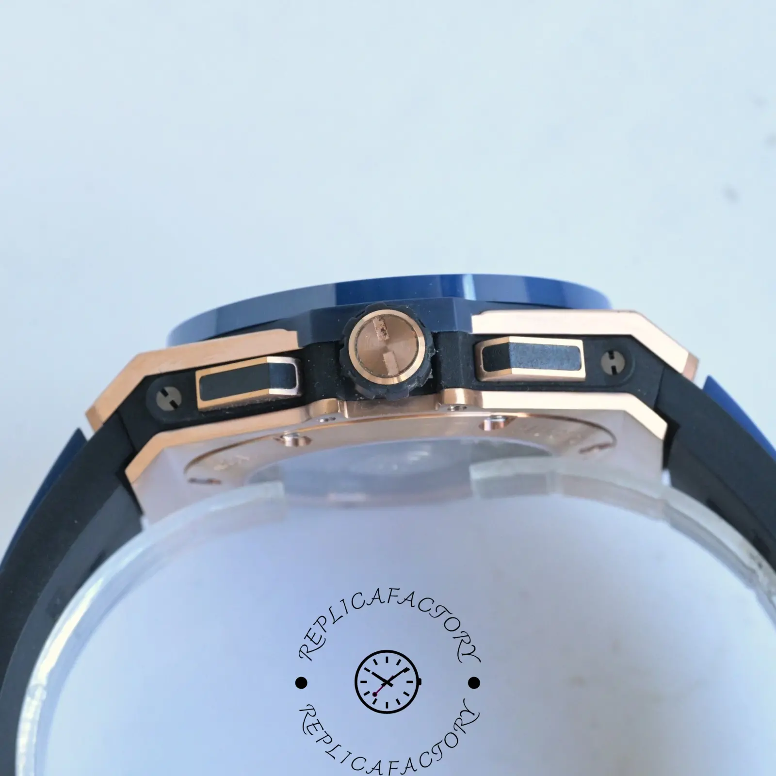 Side profile of Hublot 471.OL.7128.RX showing crown and protective guards.