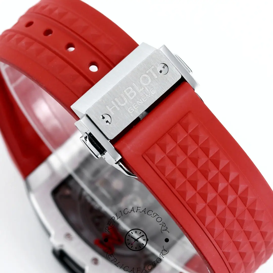 Deployant clasp of Hublot 646.CI.0110.RX.DPM24 on red rubber strap.