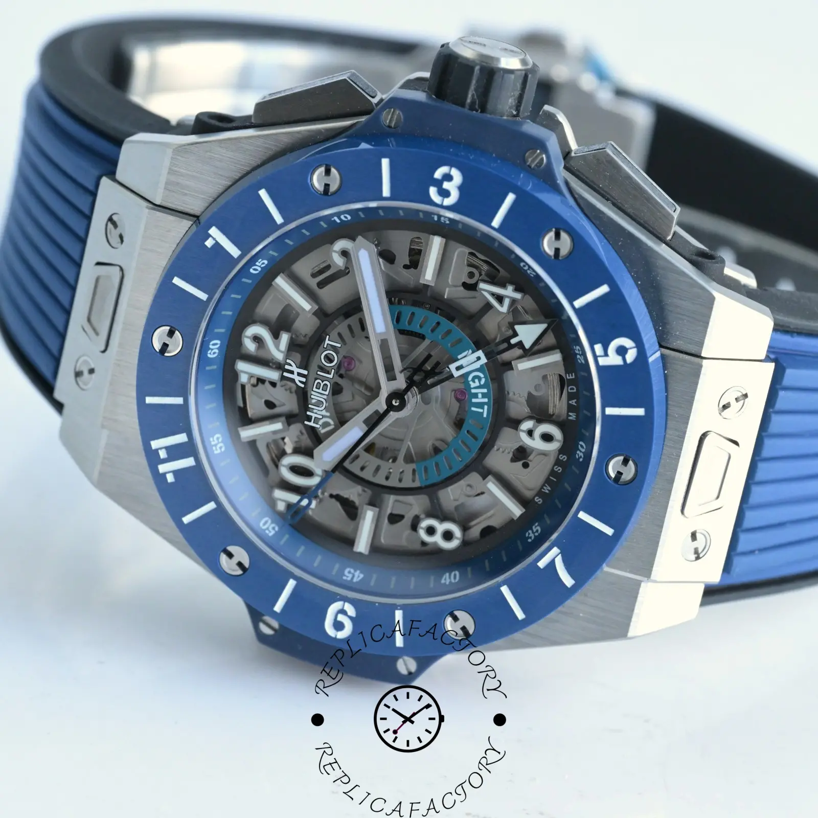 Macro angle of Hublot 471.NL.7112.RX bezel and crown with detailed finishing.