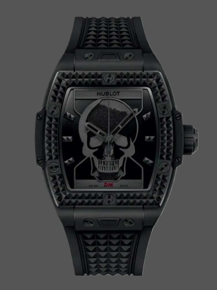 Front view of replica Hublot 646.CI.0110.RX.DPM24 showing skull dial and studded bezel.