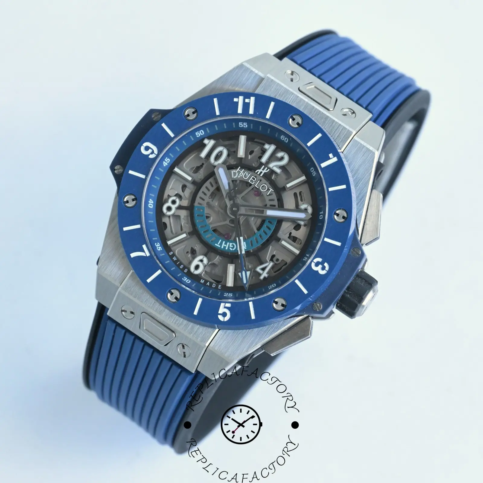 Close side-angle view of Hublot 471.NL.7112.RX with blue GMT ring visible.
