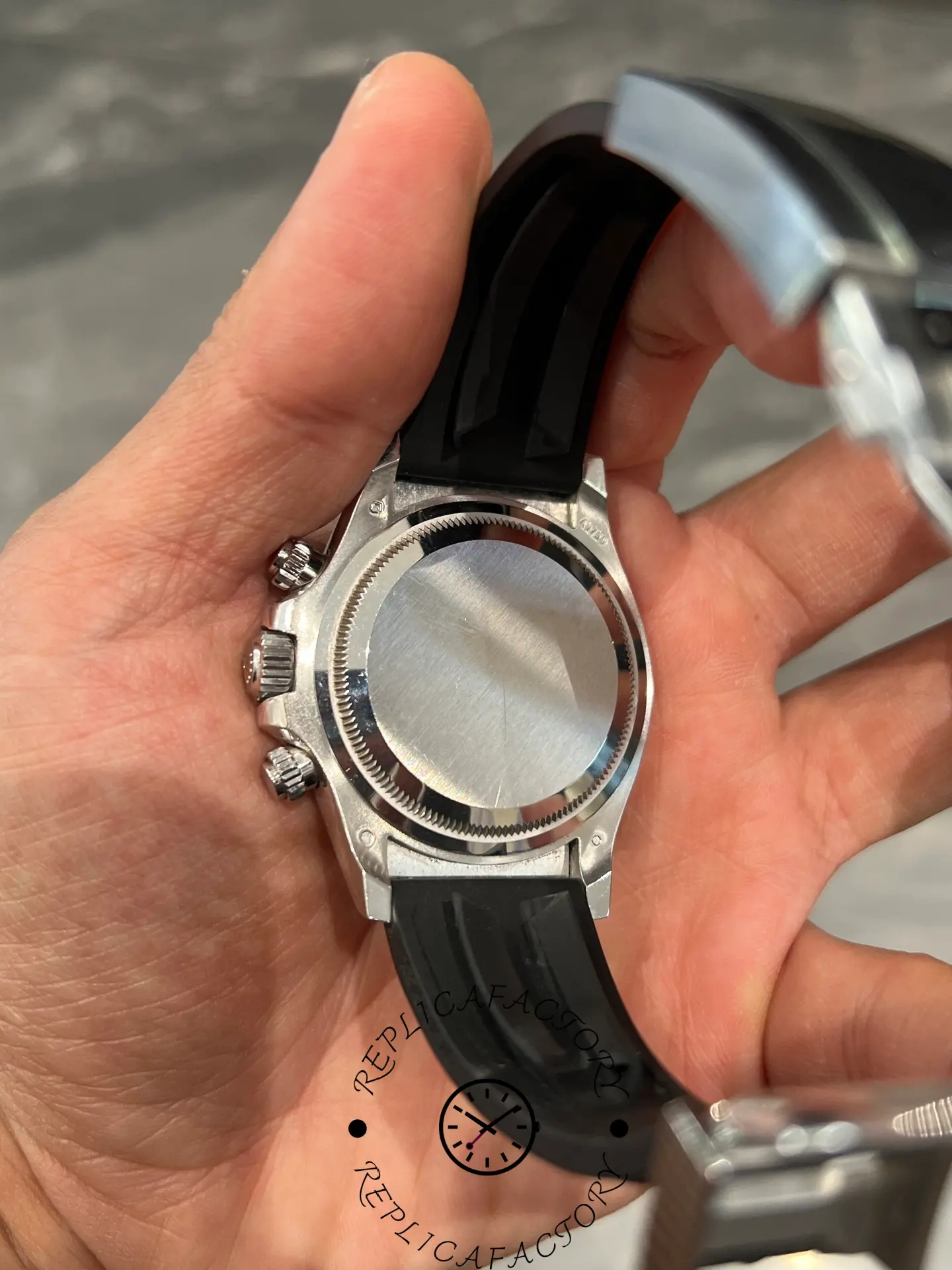 Back view of Rolex Daytona 126519LN showing solid caseback and Oysterflex strap details.