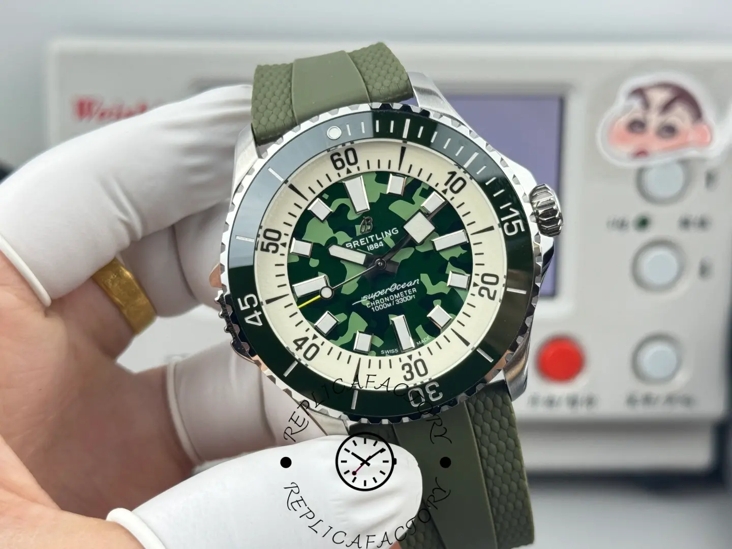 Breitling Superocean E10379D31L1S1 front shot with white chapter ring and green bezel.