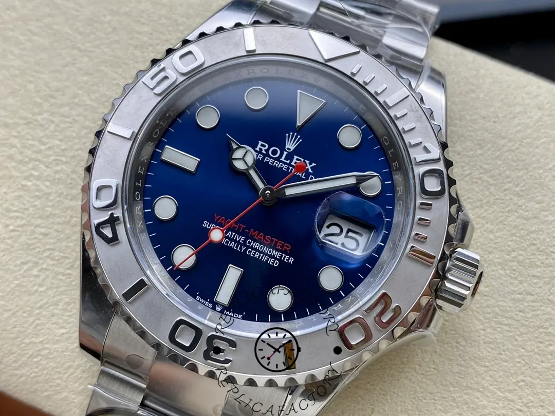 Detailed shot of Rolex Yacht-Master 126622 showing platinum bezel texture and blue sunburst dial.