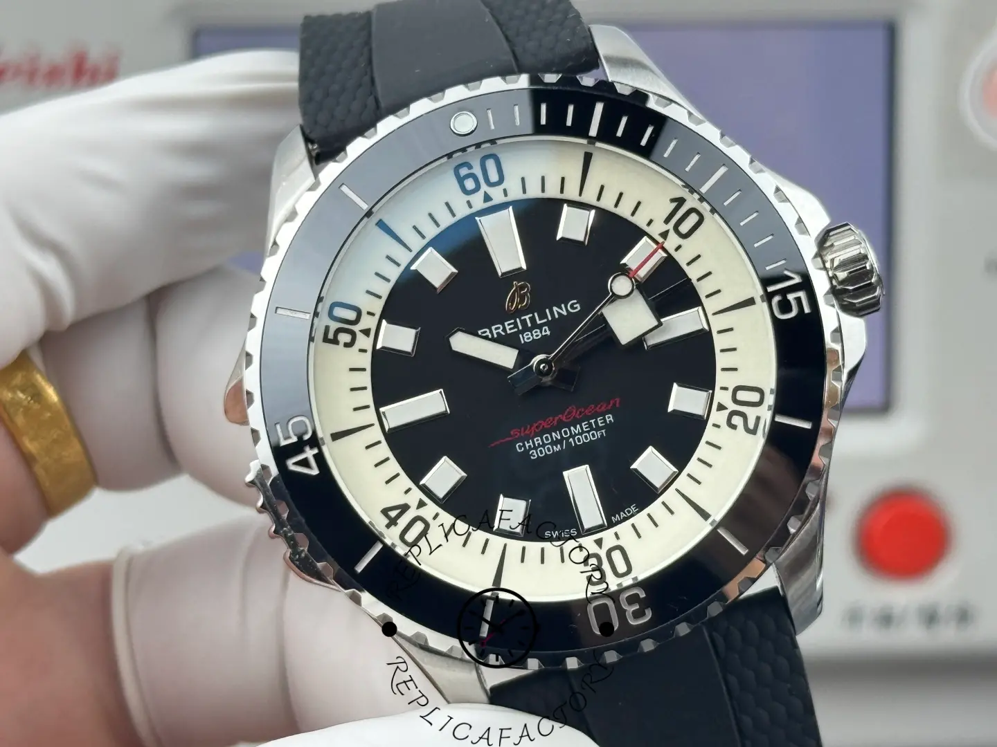 Macro shot of Breitling Superocean A17378211B1S1 replica with red-tipped second hand.