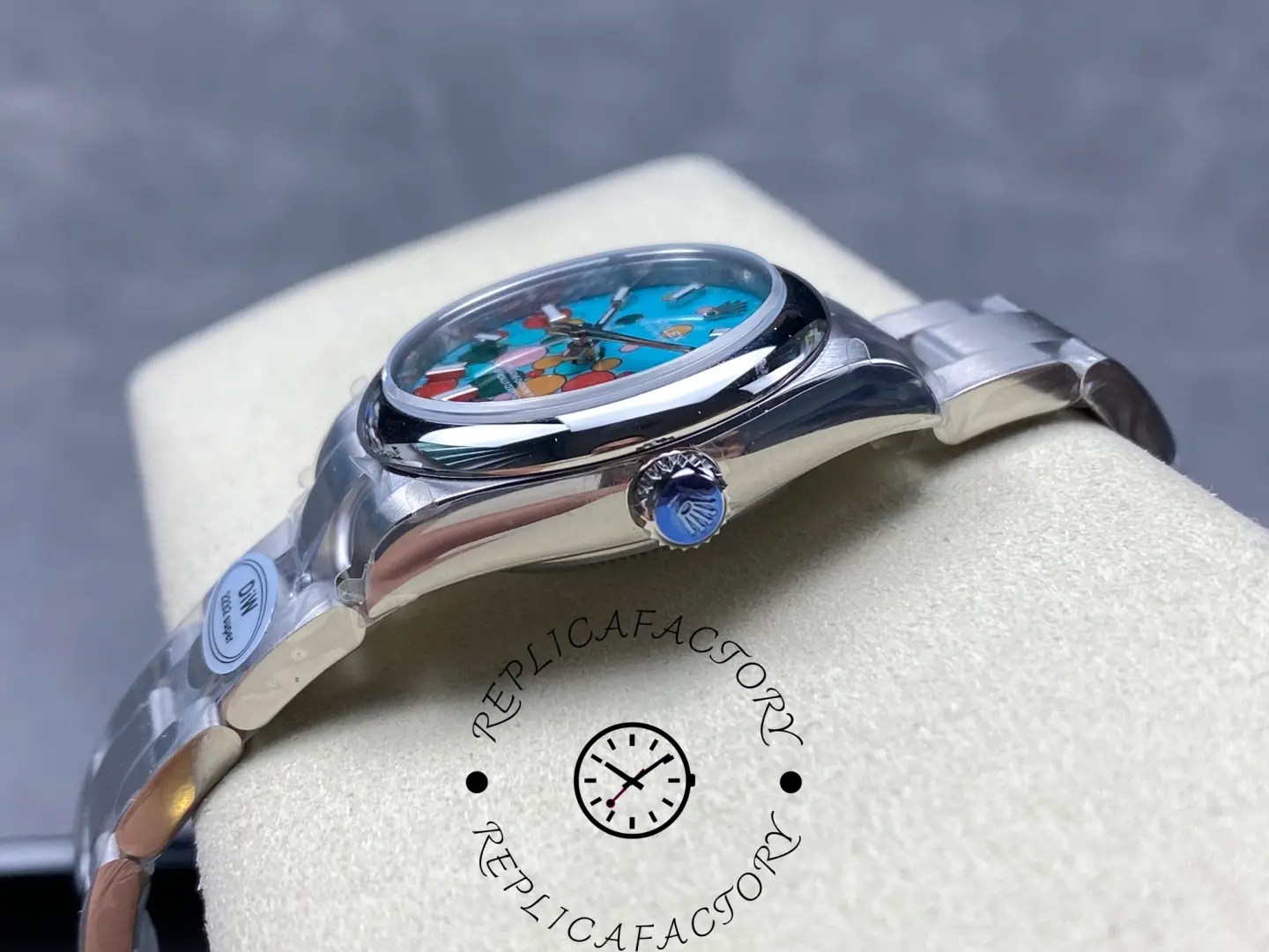 Crown-side view of replica Rolex 277200 with engraved crown logo.