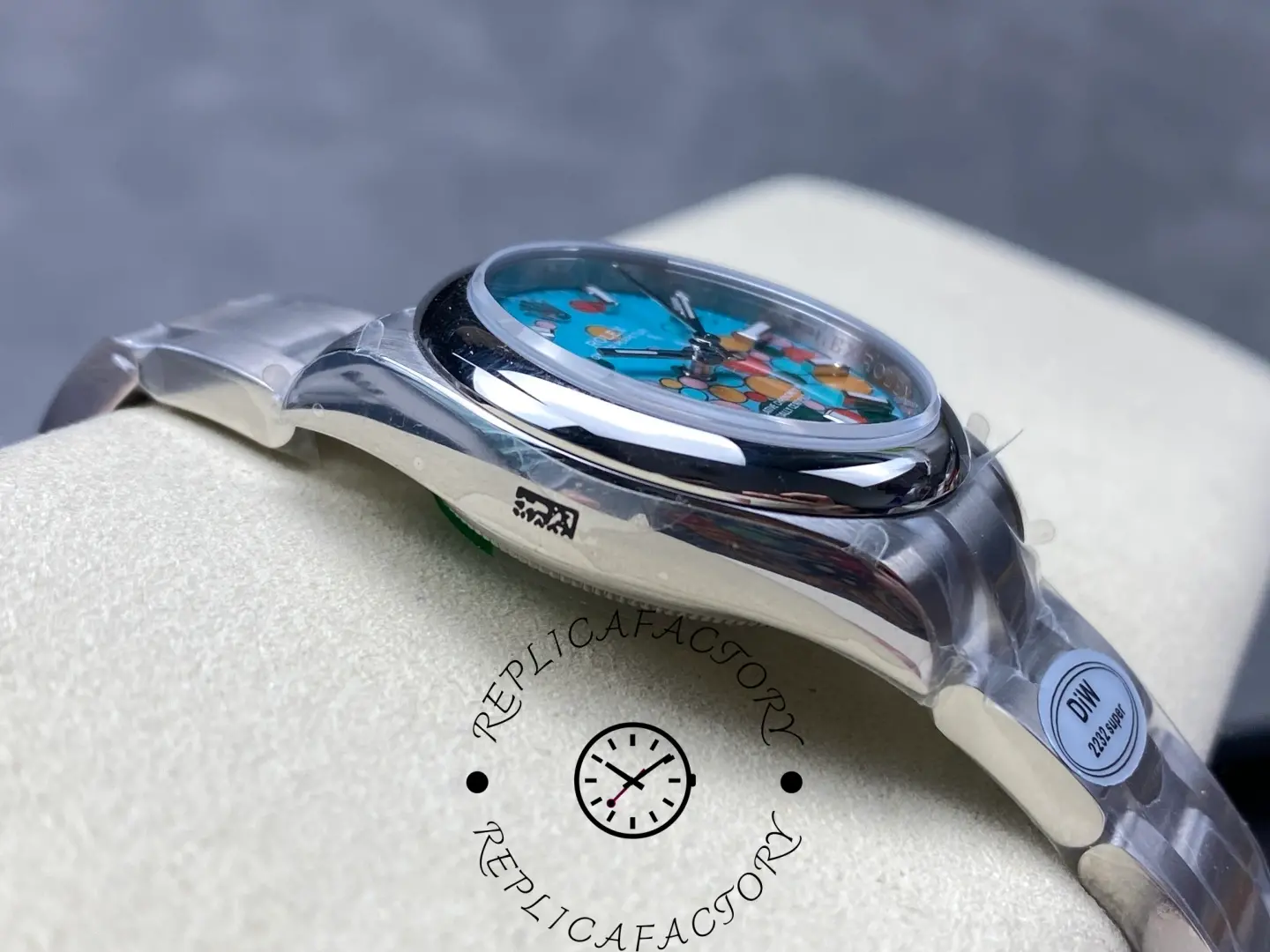 Side profile of replica Rolex 277200 showing polished case and dial curvature.