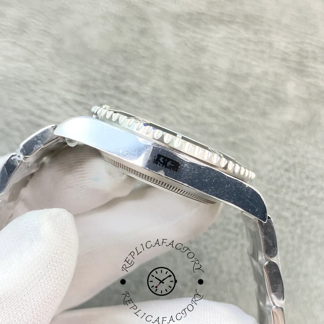 Opposite side view of Rolex Submariner 114060 showing polished case and bezel edge.