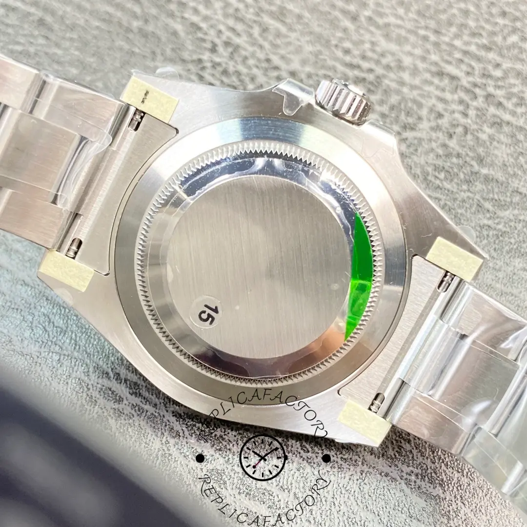 Back view of Rolex Submariner 114060 showing caseback and bracelet attachment.